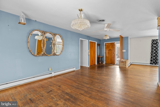 unfurnished living room with hardwood / wood-style floors, ceiling fan with notable chandelier, and baseboard heating