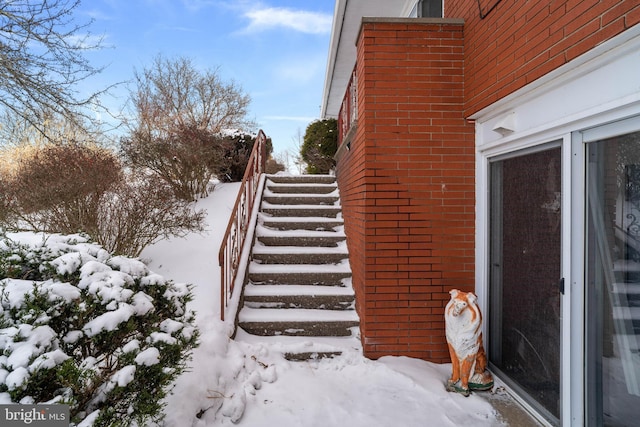 view of snow covered property