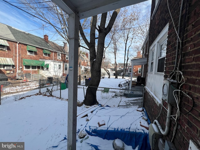 view of yard covered in snow