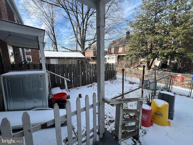 view of snow covered patio