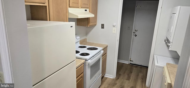 kitchen featuring wood-type flooring, light brown cabinetry, and white appliances