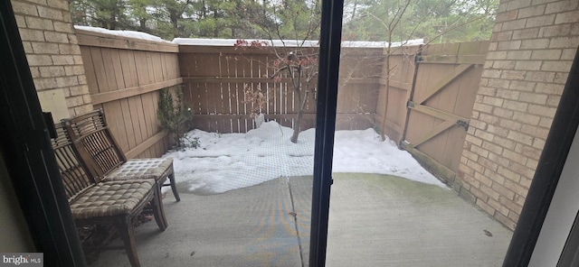 view of snow covered patio