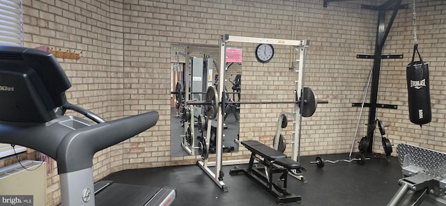 gym with brick wall