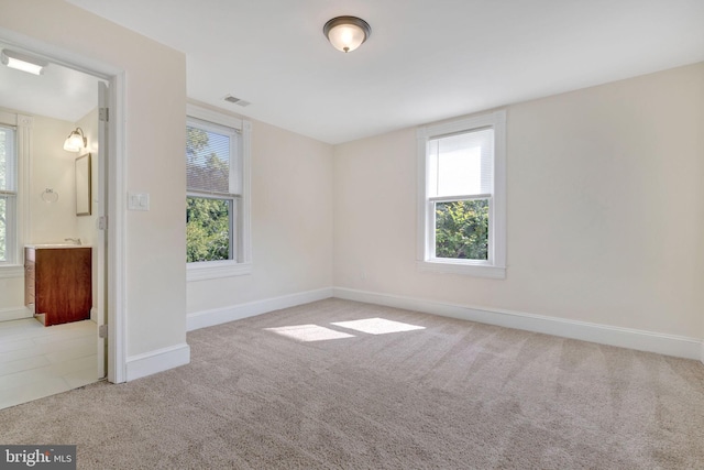 view of carpeted spare room