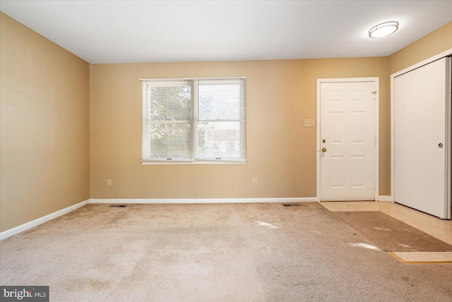 entryway with carpet