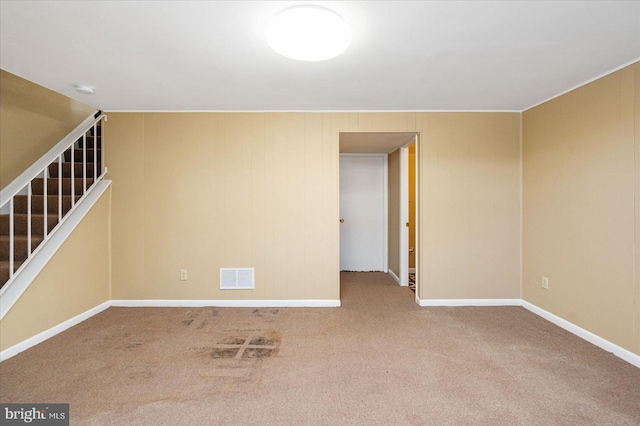 empty room with carpet flooring