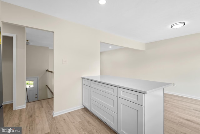 corridor featuring light hardwood / wood-style flooring