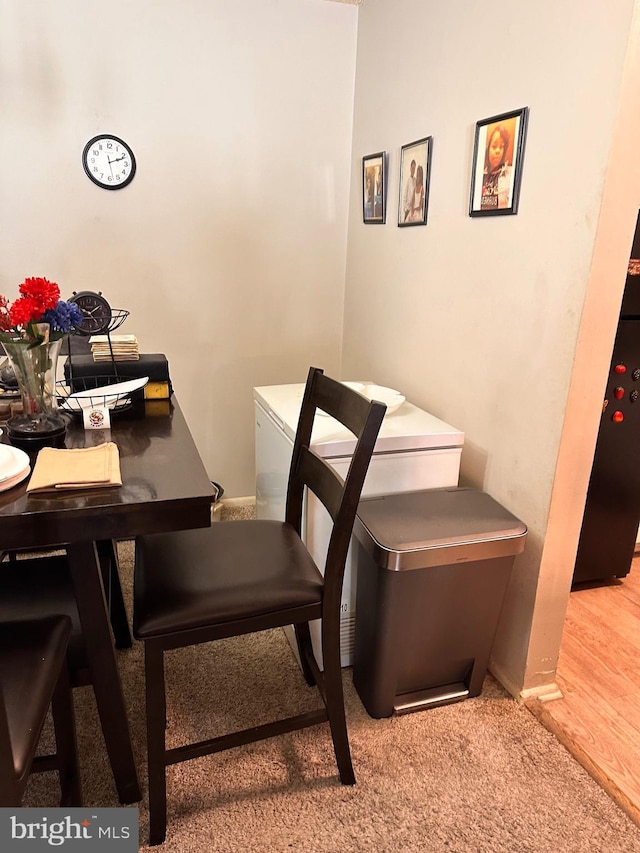 view of carpeted dining space