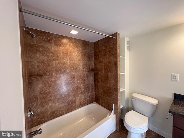 bathroom featuring bathtub / shower combination, baseboards, vanity, and toilet