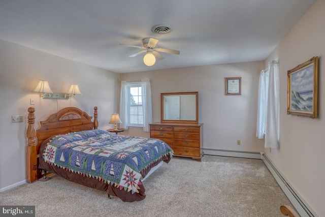 carpeted bedroom with a baseboard radiator and ceiling fan