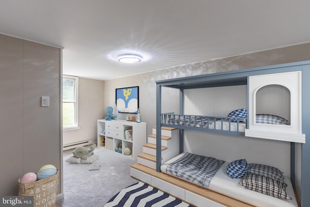 bedroom featuring carpet and a baseboard heating unit