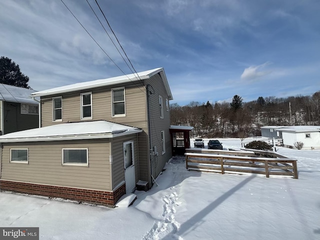 view of snow covered property