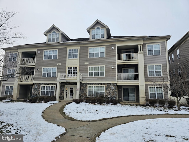 view of snow covered building