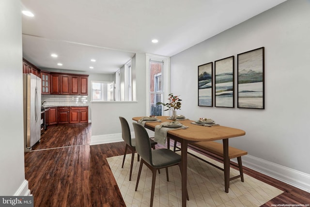 dining room featuring dark wood-type flooring