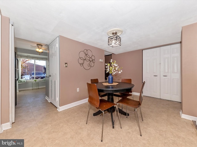 dining space with ceiling fan