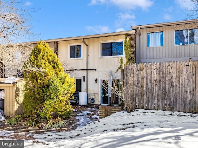 view of snow covered property