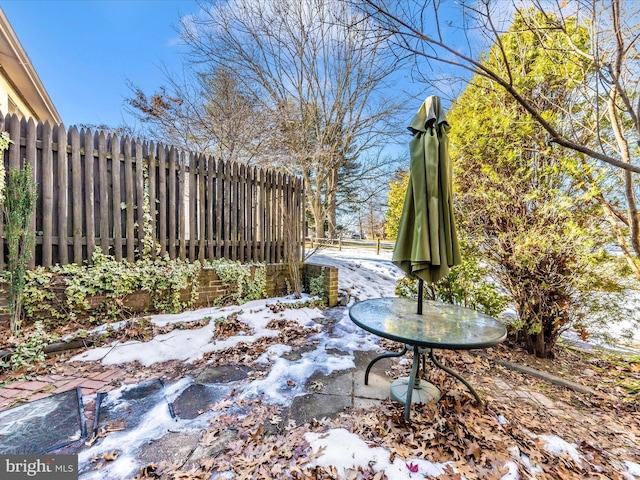 view of snow covered patio