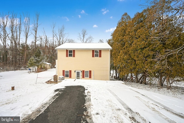 view of snow covered house