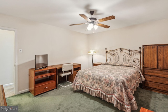 bedroom with dark carpet and ceiling fan