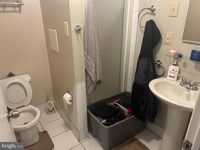 bathroom with an enclosed shower, sink, tile patterned floors, and toilet