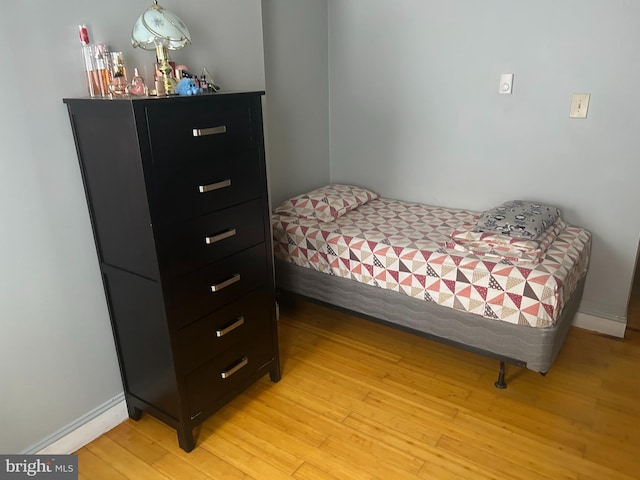 bedroom with light hardwood / wood-style floors