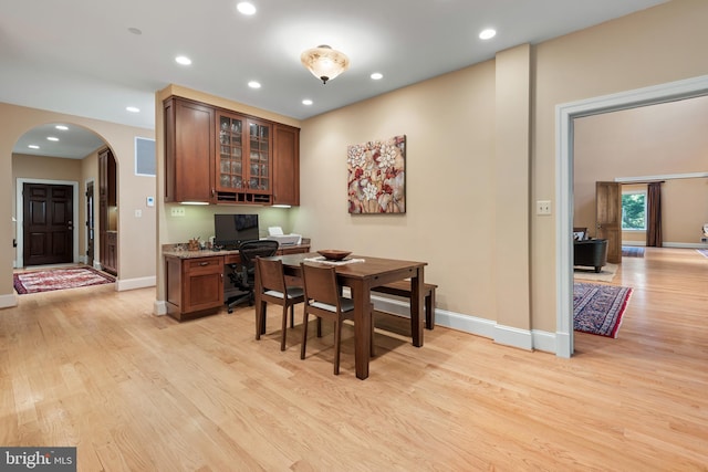 dining area with light hardwood / wood-style floors