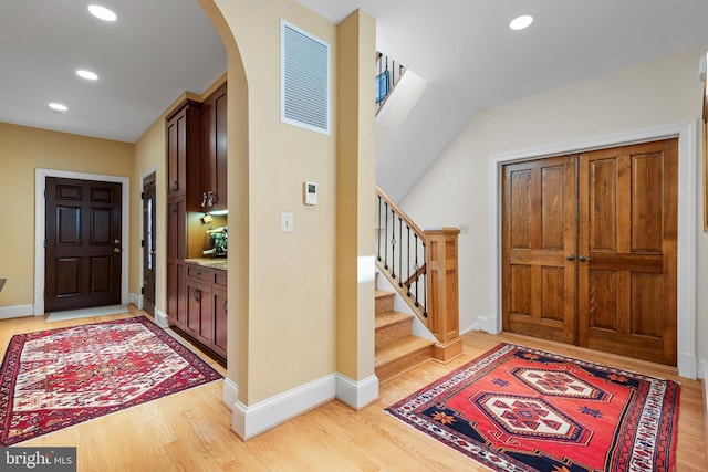 foyer entrance featuring light hardwood / wood-style floors