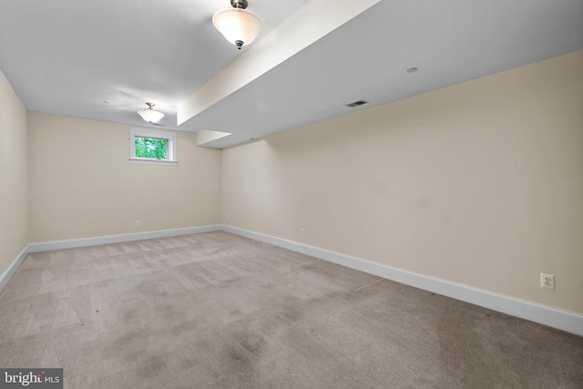 basement with light carpet