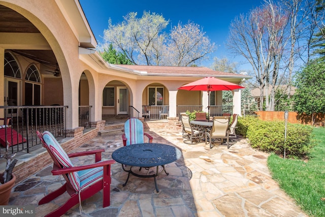 view of patio / terrace featuring ceiling fan