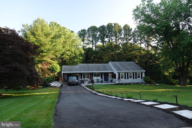 view of front of home with a front lawn