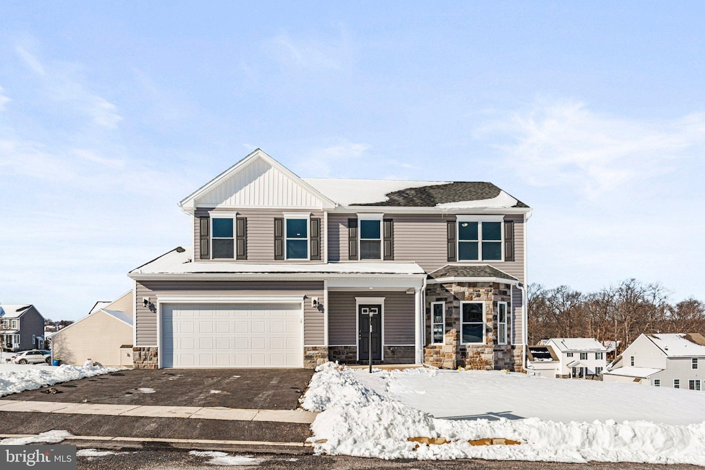 view of front of home with a garage