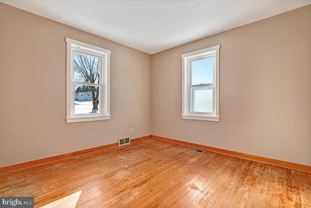 empty room featuring light hardwood / wood-style floors