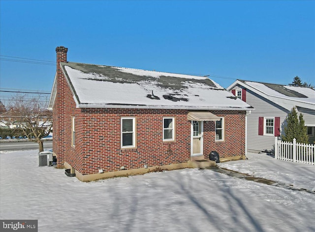 view of front of house featuring central air condition unit