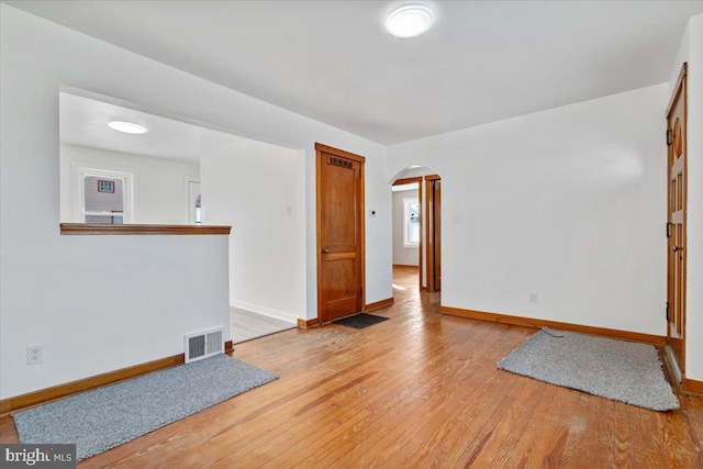 unfurnished room featuring wood-type flooring