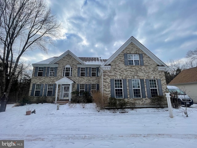 view of front of property with brick siding