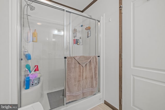 bathroom featuring an enclosed shower