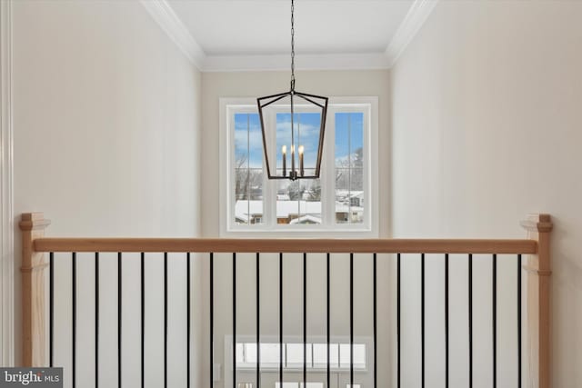 room details featuring an inviting chandelier and ornamental molding