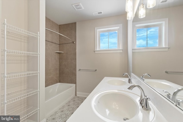 bathroom with sink, tile patterned floors, and independent shower and bath