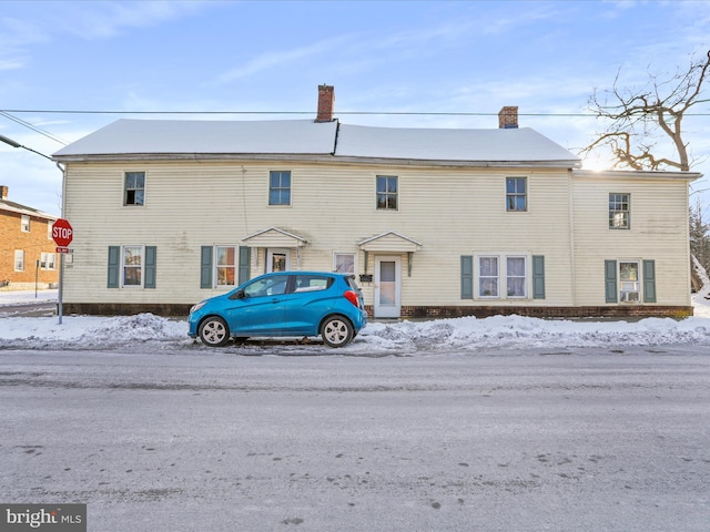 view of snow covered property