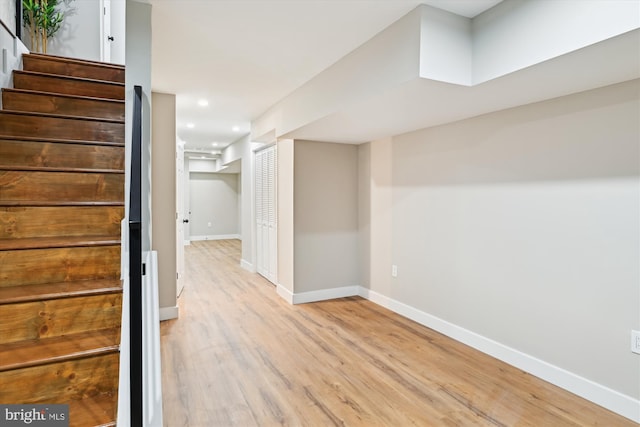 basement with light wood-type flooring