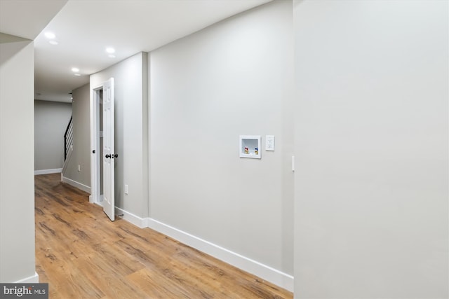 corridor featuring light wood-type flooring