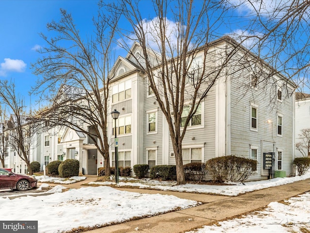 view of snow covered building