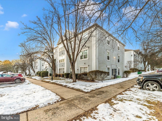 view of snow covered property