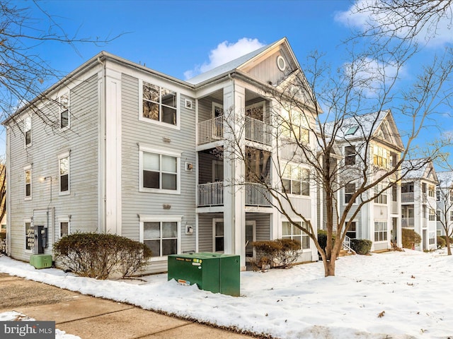 view of snow covered property