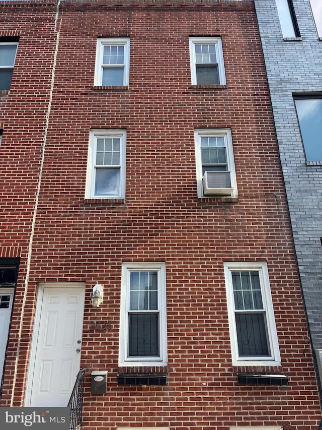 view of property featuring cooling unit