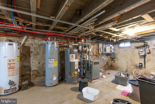 basement with water heater and gas water heater