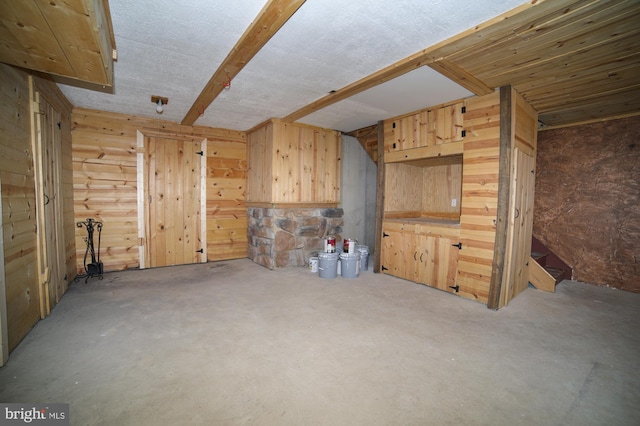 basement with wood walls