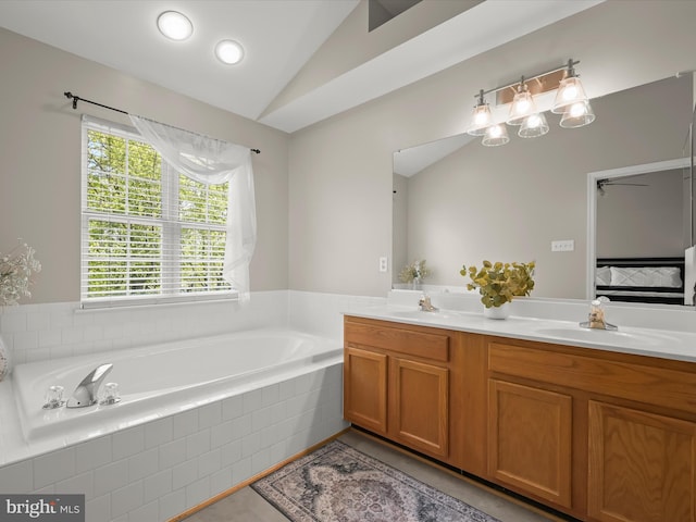 6422 Frothingham Ct, Elkridge, MD 21075 - ensuite bathroom featuring lofted ceiling, double vanity, a bath, and tile patterned flooring