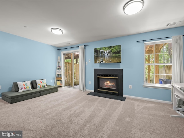 6422 Frothingham Ct, Elkridge, MD 21075 - carpeted living area with a fireplace with flush hearth and baseboards
