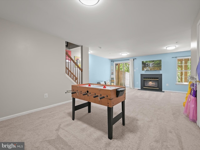 6422 Frothingham Ct, Elkridge, MD 21075 - game room featuring carpet, baseboards, and a fireplace with flush hearth